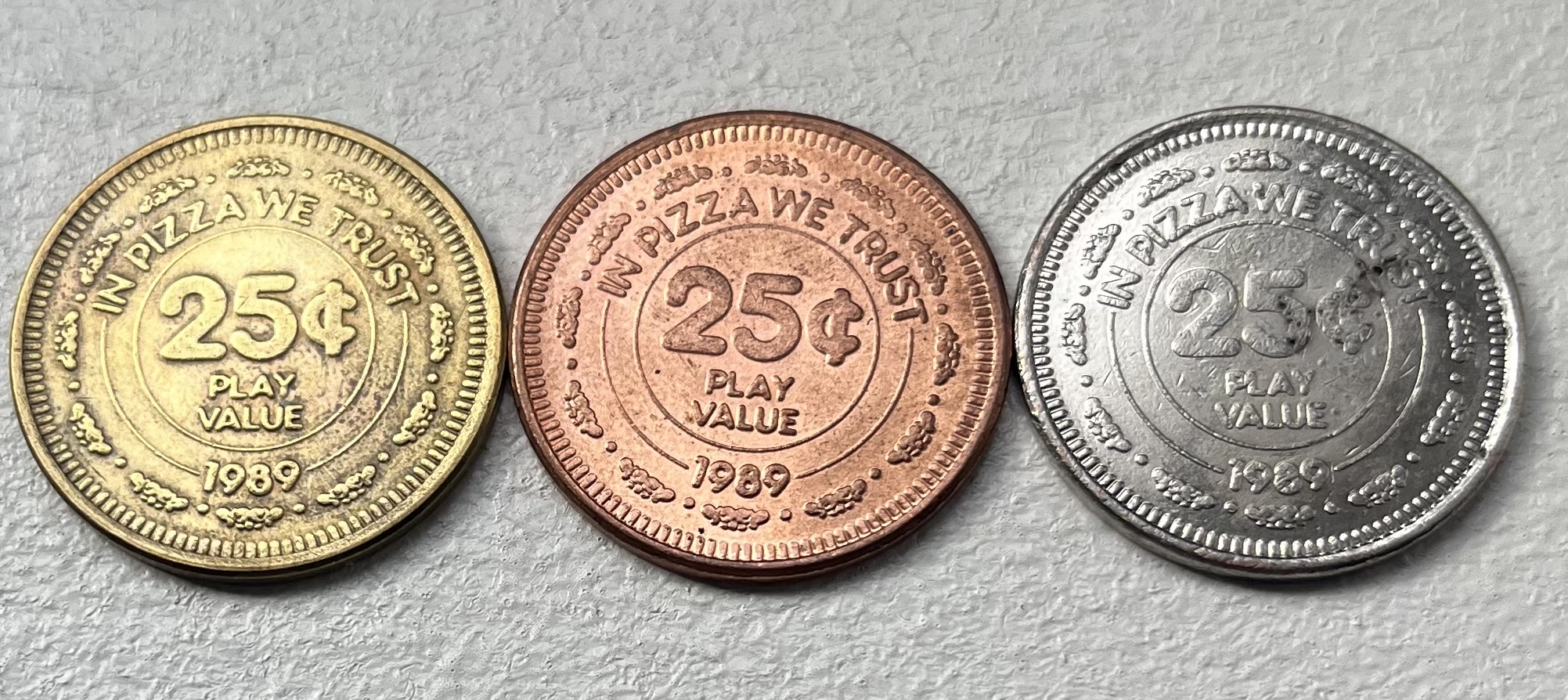 1989 Chuck E. Cheese Token in Brass, Copper, and Nickel