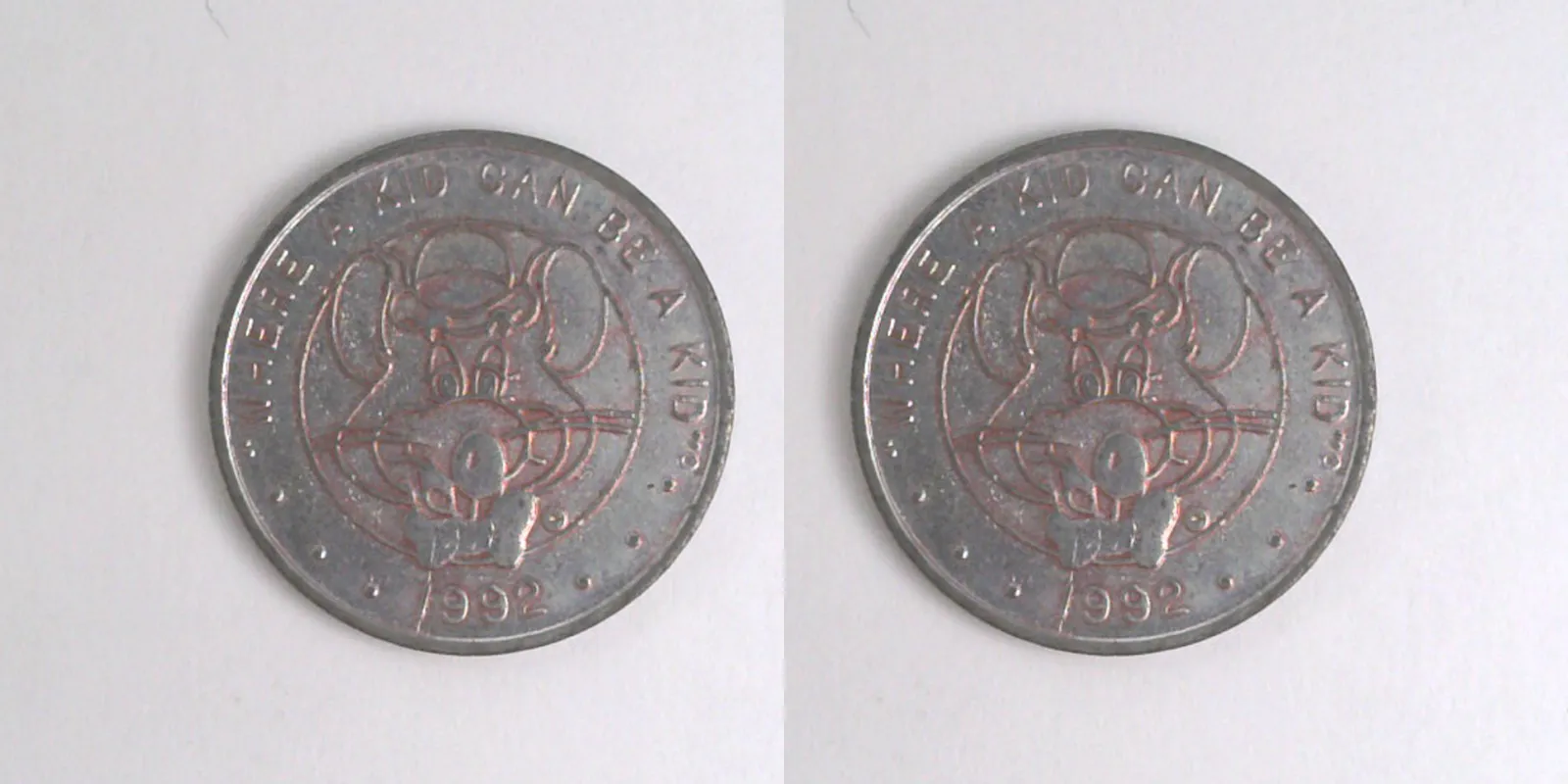 Chuck E. Cheese 309aN 1992 Chuck E Cheese Token (309aN) (1992) token — front