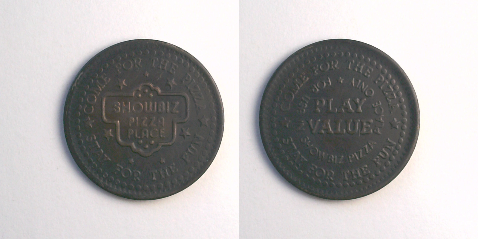 ShowBiz Pizza S09aN-black Showbiz Pizza Place Token (S09aN-black) token — front and reverse