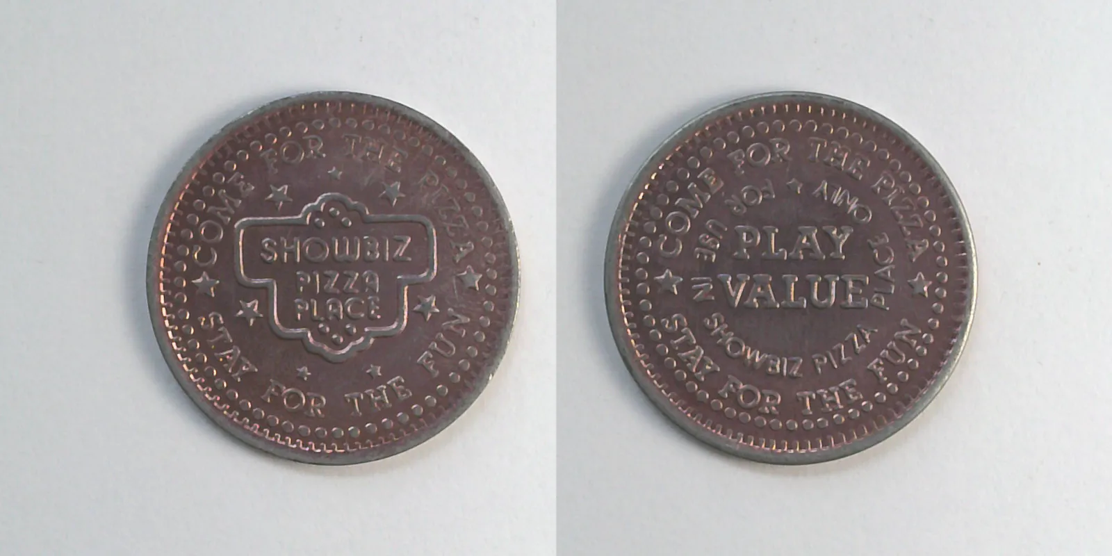 ShowBiz Pizza S09aN-pink Showbiz Pizza Place Token (S09aN-pink) token — front and reverse