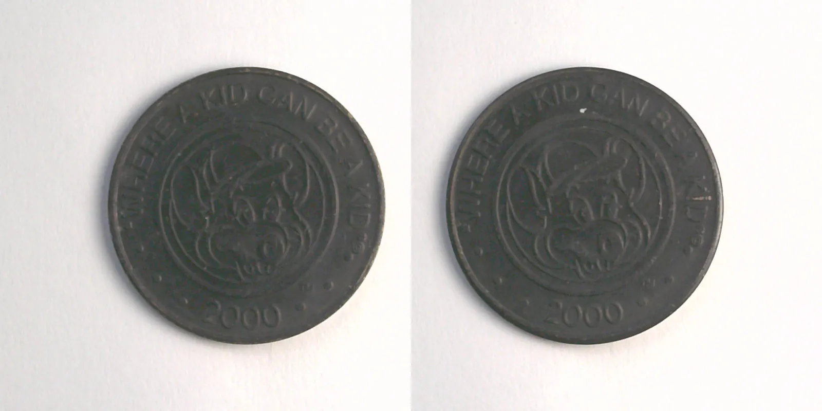 Chuck E. Cheese 406bB 2000 Chuck E Cheese Token (406bB) (2000) token — front and reverse