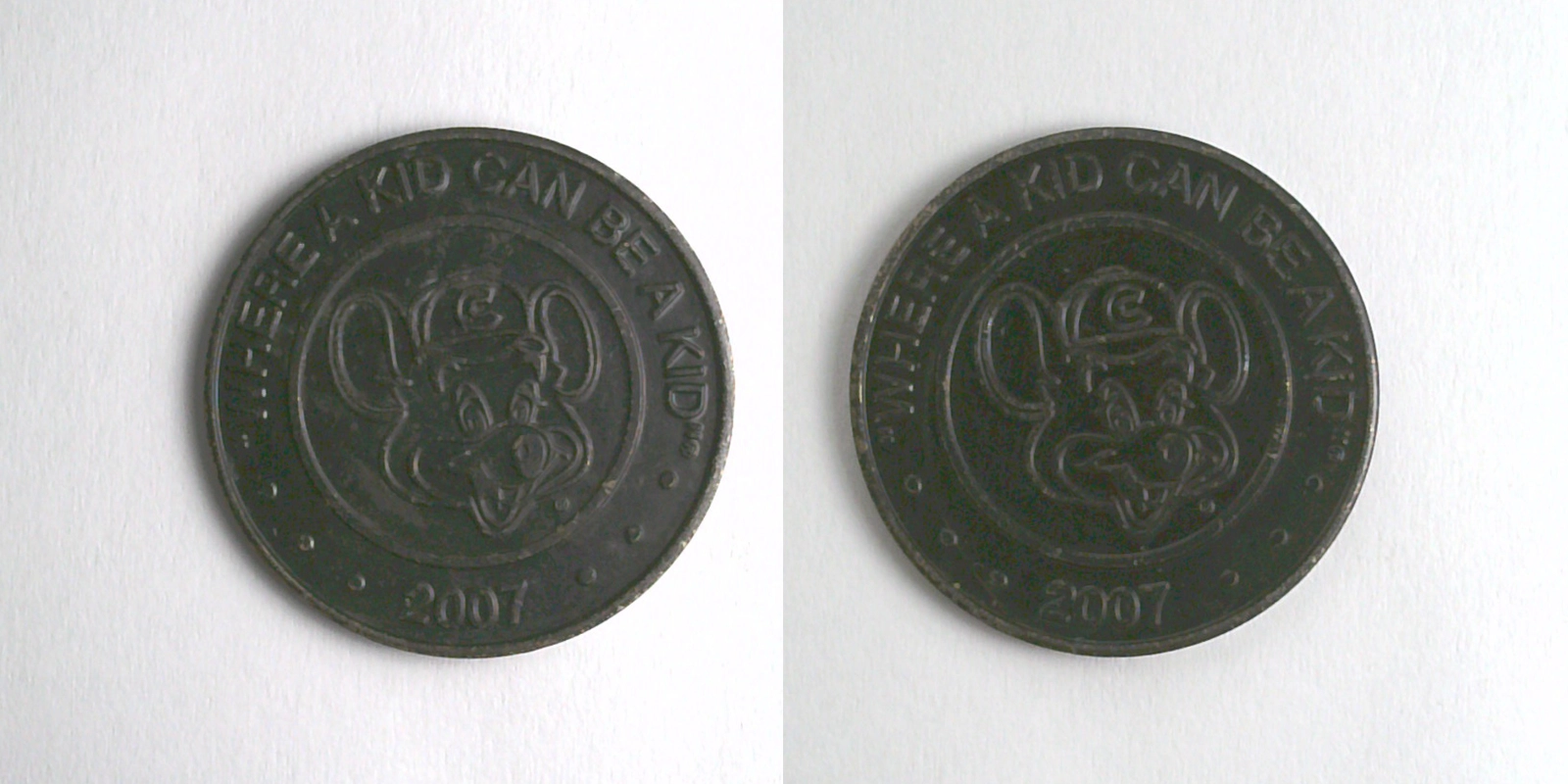 Chuck E. Cheese 414bB 2007 Chuck E Cheese Token (414bB) (2007) token — front