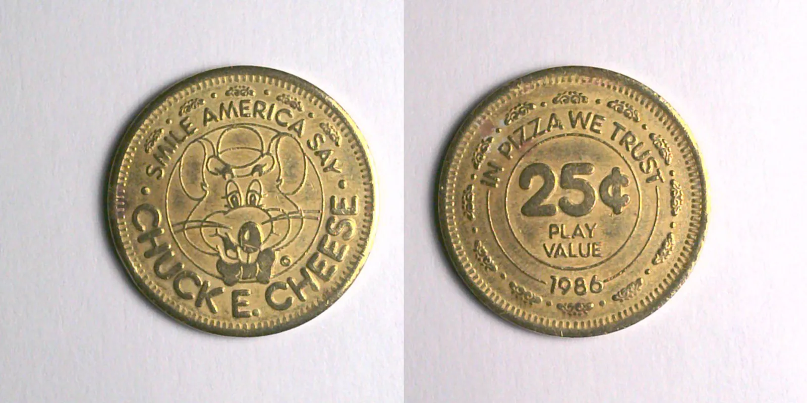 Chuck E. Cheese 209B 1986 Chuck E Cheese Token (209B) (1986) token — front and reverse