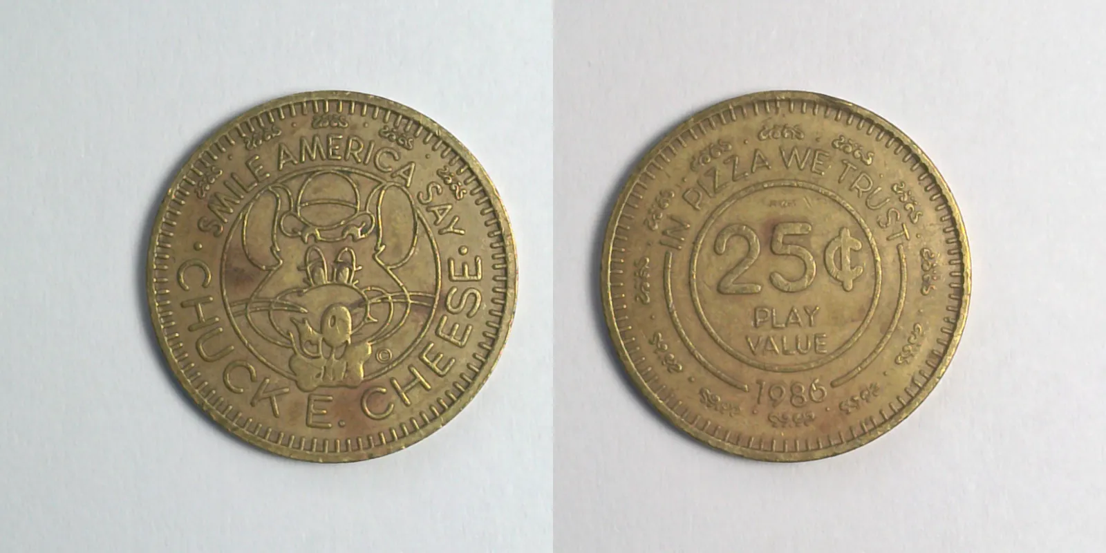 Chuck E. Cheese 211B 1986 Chuck E Cheese Token (211B) (1986) token — front and reverse