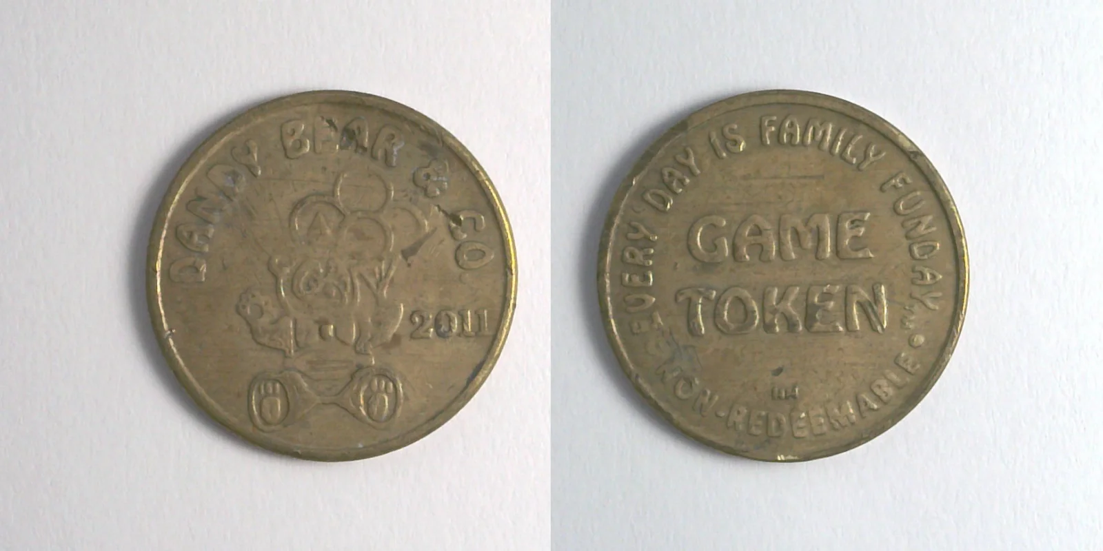 Dandy Bear DB121B 2011 Dandy Bear Token (DB121B) (2011) token — front and reverse