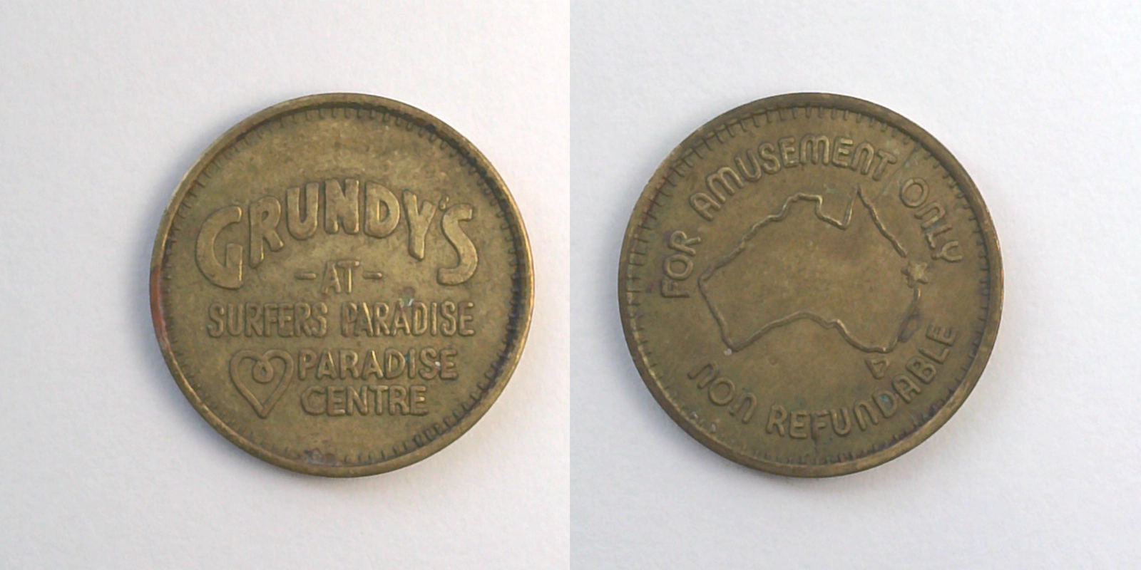 Grundy's G102B Grundy's Token (G102B) token — front and reverse