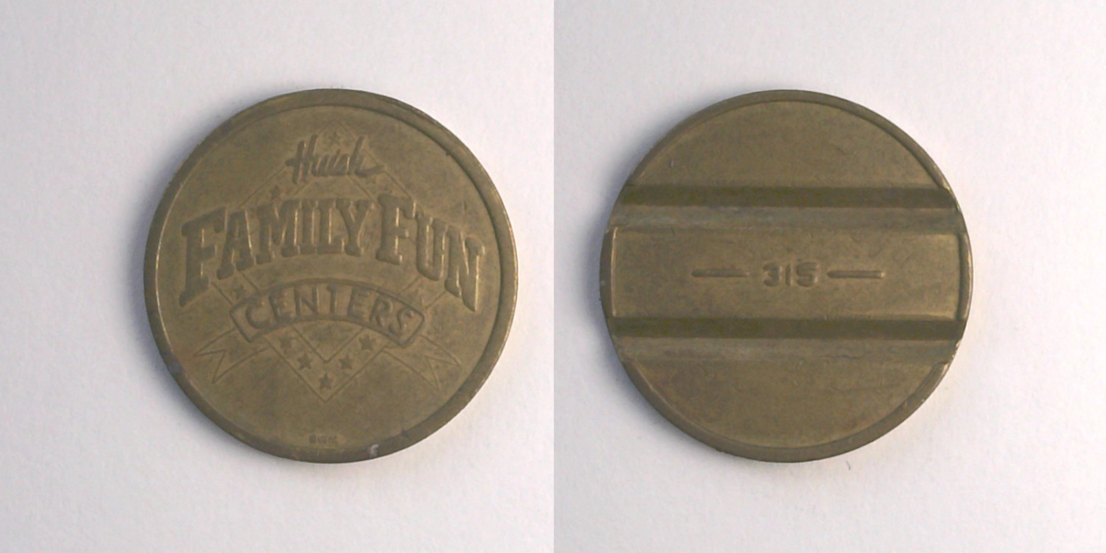 Bullwinkle's Entertainment BW502B Huish Family Fun Centers --315-- Token (BW502B) token — front