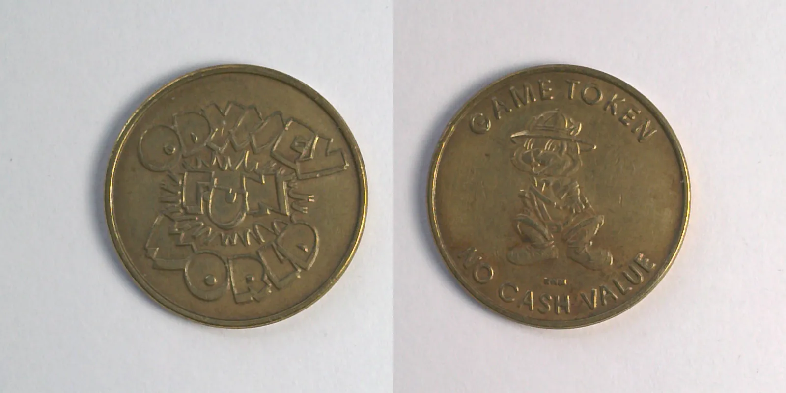 Odyssey Fun World OFW103B Odyssey Fun World Token (OFW103B) token — front and reverse