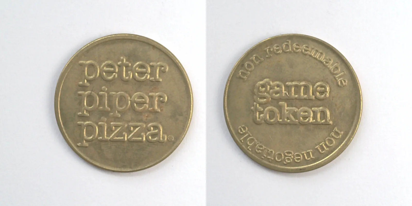 Peter Piper Pizza P409B Peter Piper Pizza Token (P409B) token — front and reverse