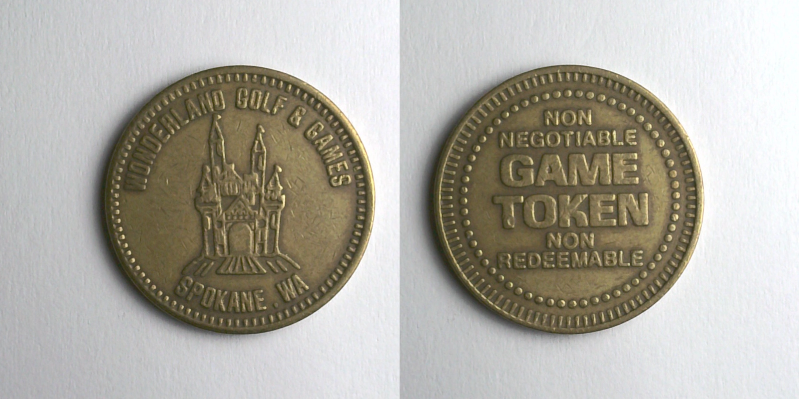 Wonderland Golf & Games WGG101B Wonderland Golf & Games Token (WGG101B) token — front and reverse