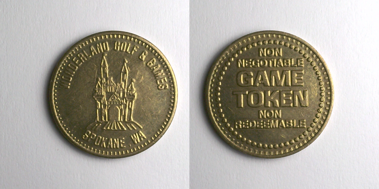 Wonderland Golf & Games WGG103B Wonderland Golf & Games Token (WGG103B) token — front and reverse