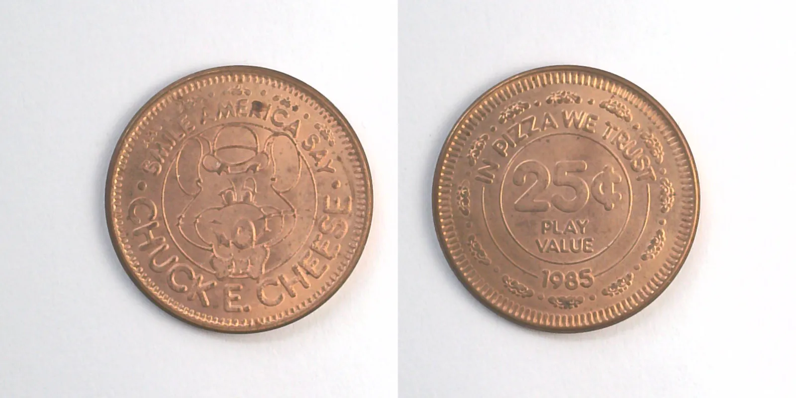 Chuck E. Cheese 207C 1985 Chuck E Cheese Token (207C) (1985) token — front and reverse
