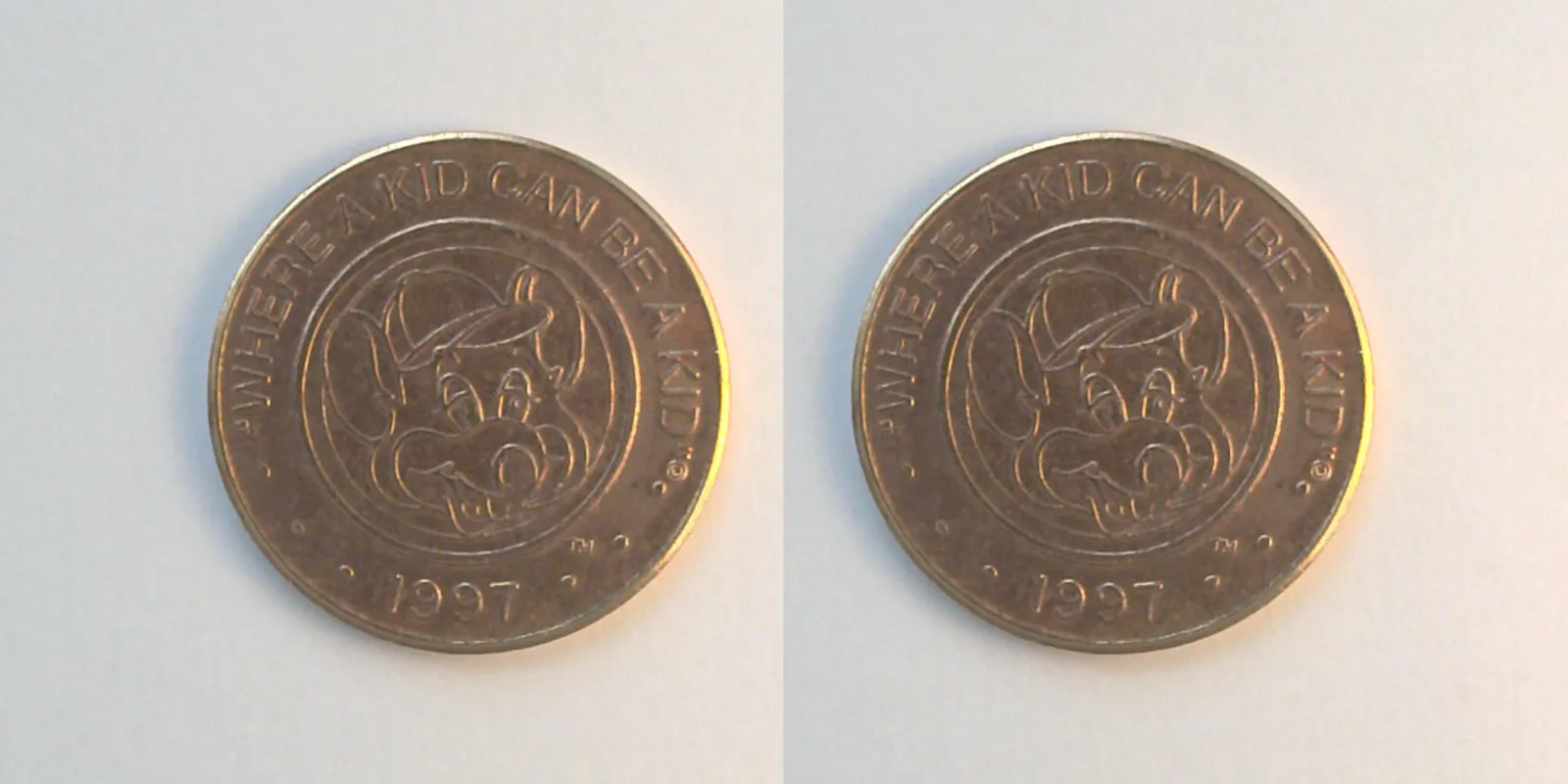 Chuck E. Cheese 403C 1997 Chuck E Cheese Token (403C) (1997) token — front and reverse