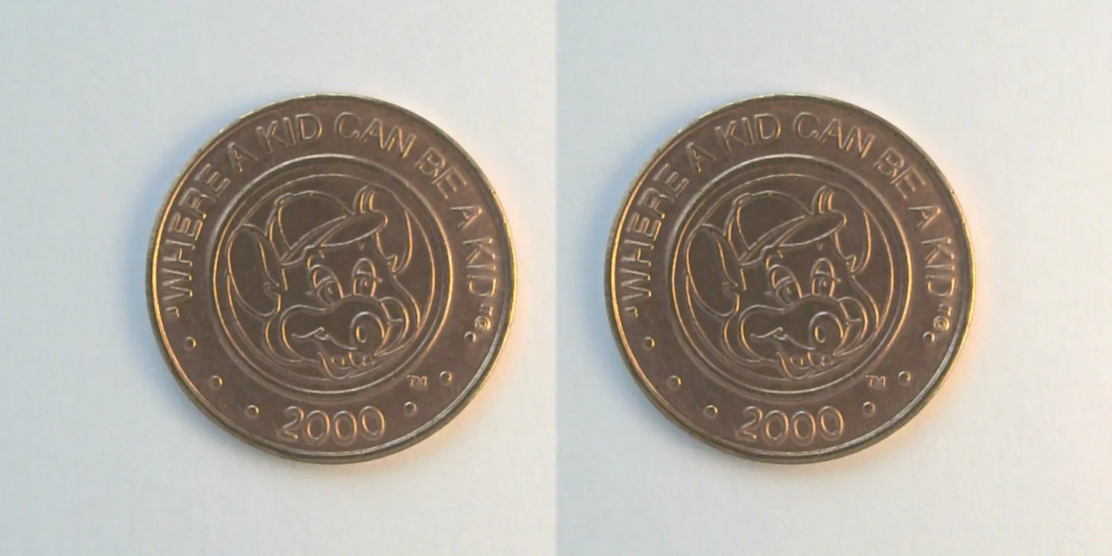 Chuck E. Cheese 406C 2000 Chuck E Cheese Token (406C) (2000) token — front
