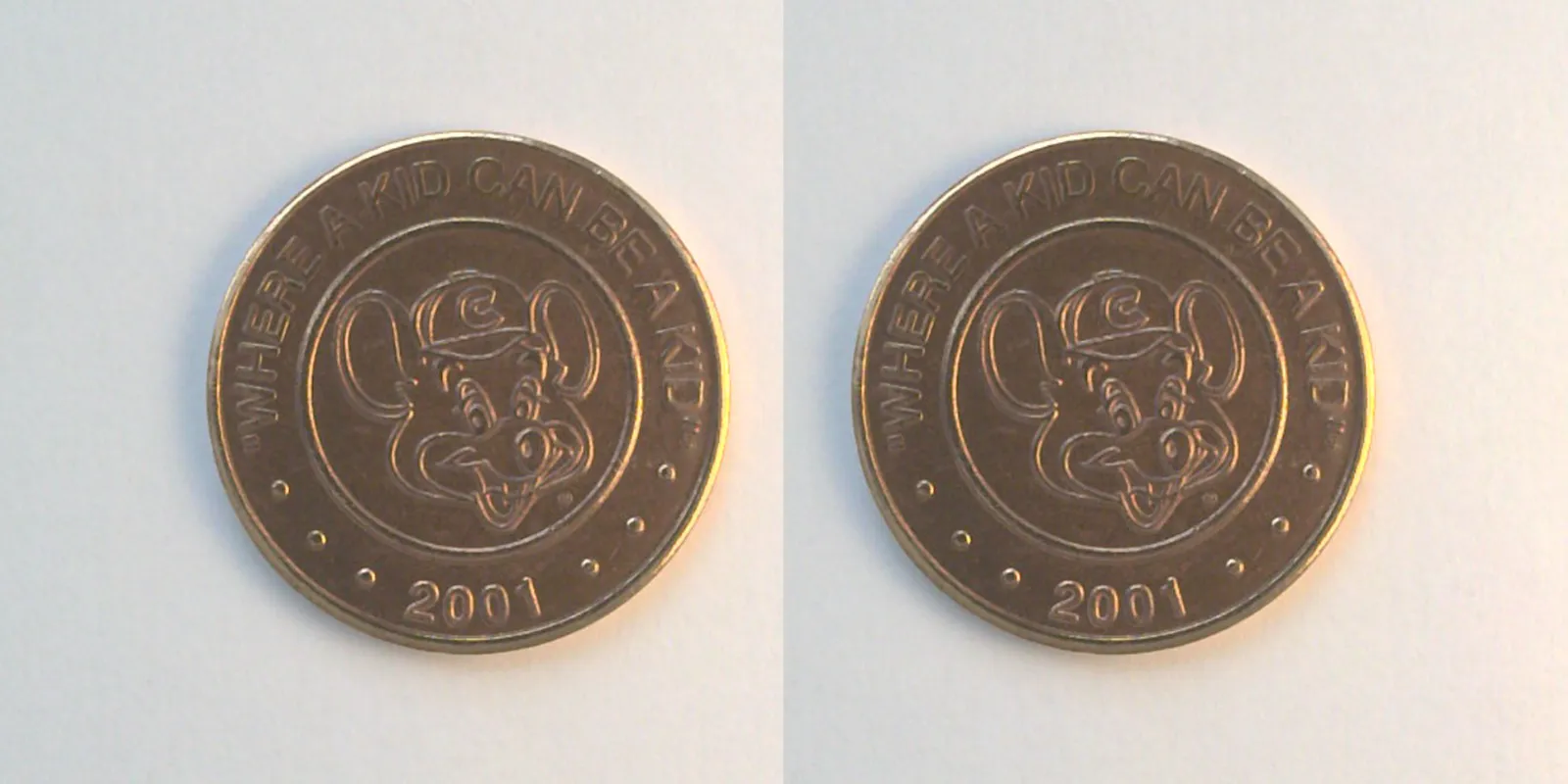 Chuck E. Cheese 408C 2001 Chuck E Cheese Token (408C) (2001) token — front
