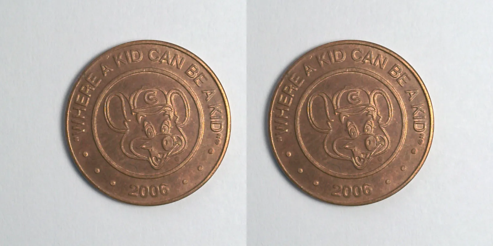 Chuck E. Cheese 413C 2006 Chuck E Cheese Token (413C) (2006) token — front and reverse