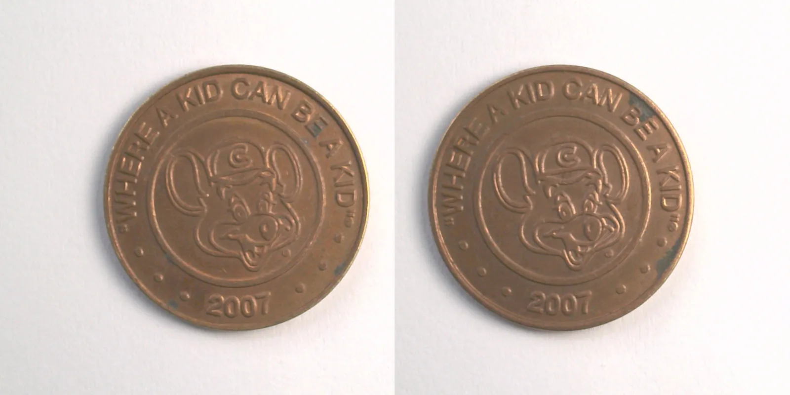 Chuck E. Cheese 414C 2007 Chuck E Cheese Token (414C) (2007) token — front