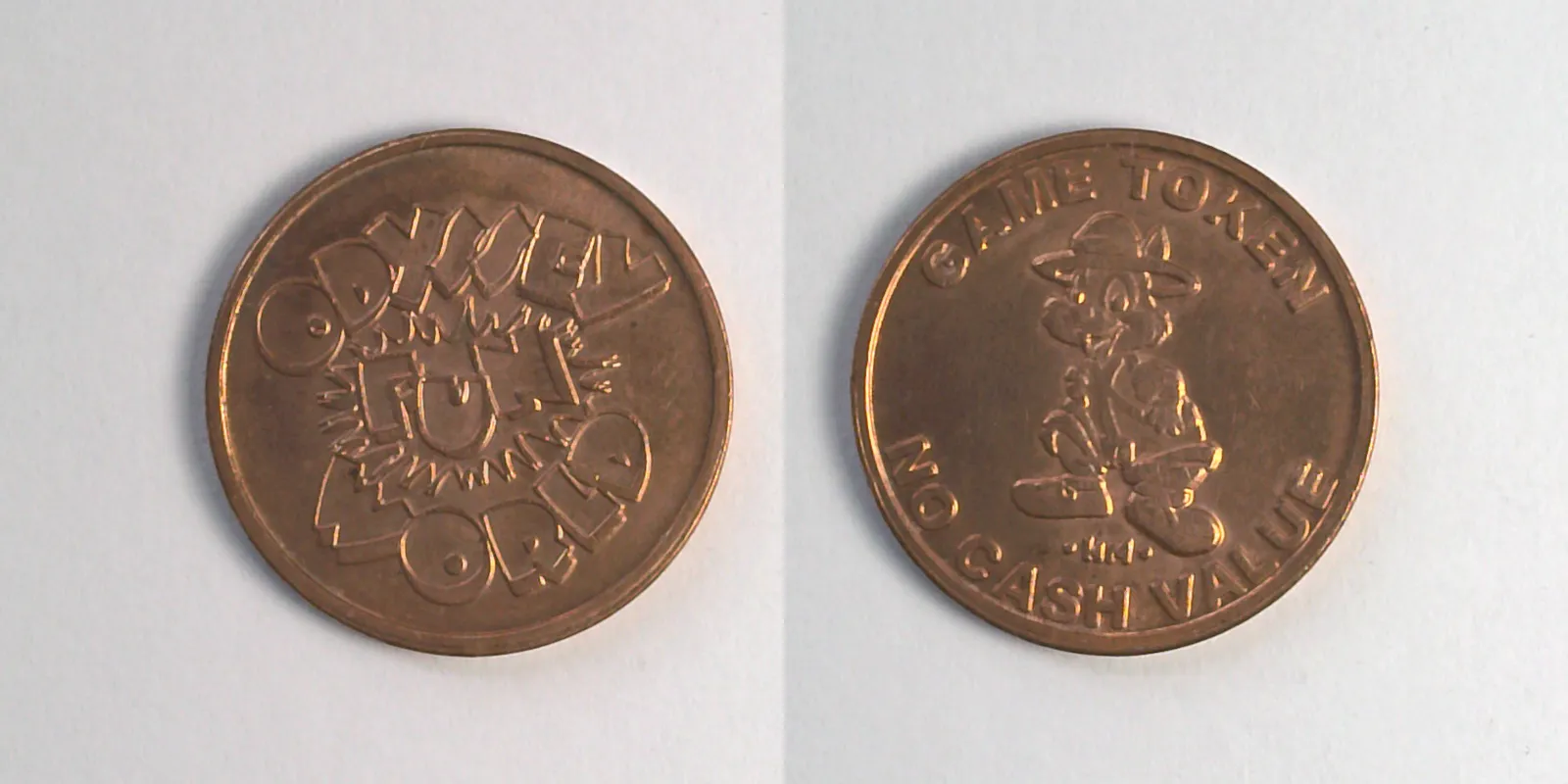 Odyssey Fun World OFW102C Odyssey Fun World Token (OFW102C) token — front and reverse