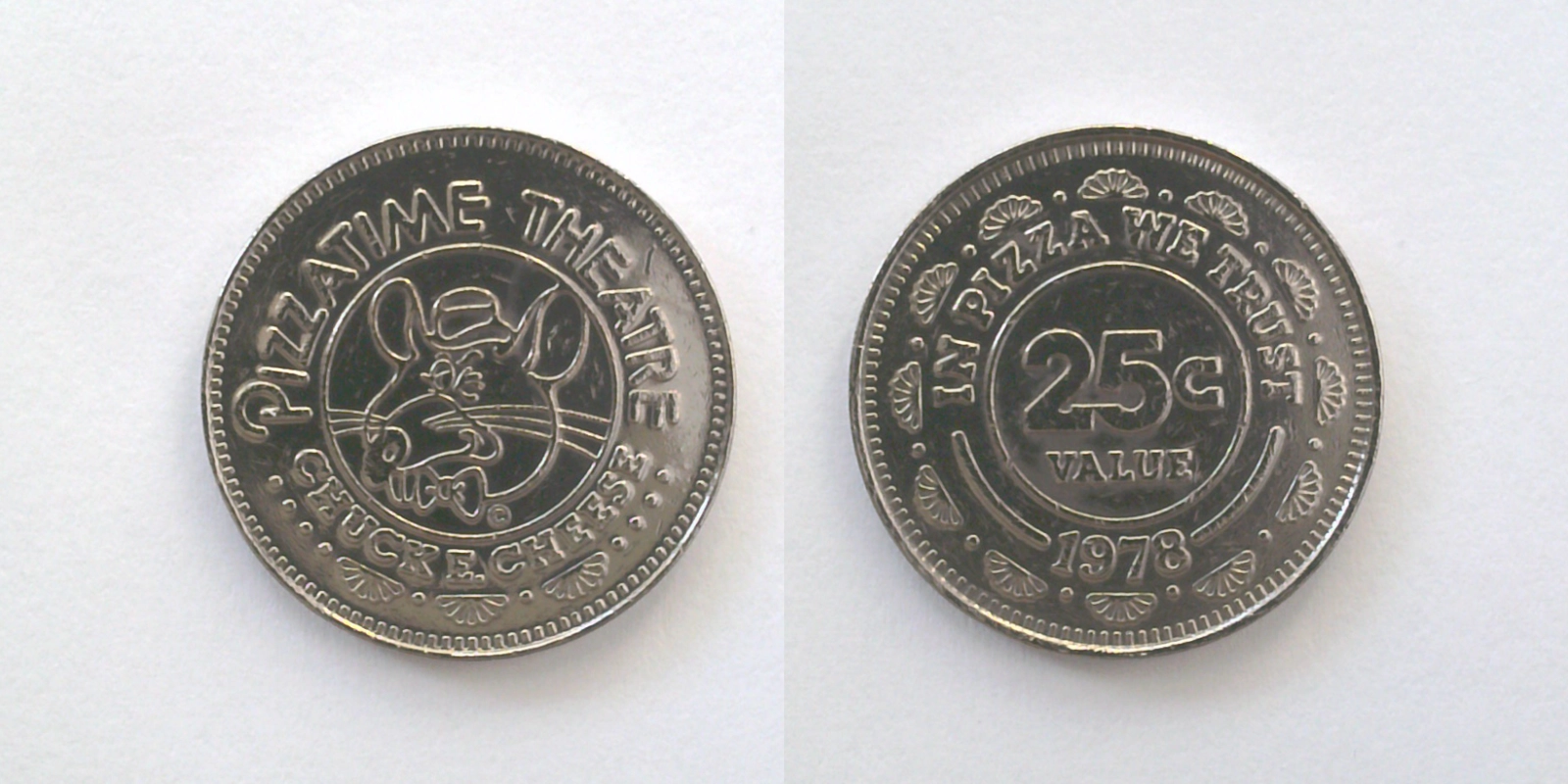 Chuck E. Cheese 102N 1978 Chuck E Cheese Token (102N) (1978) token — front and reverse