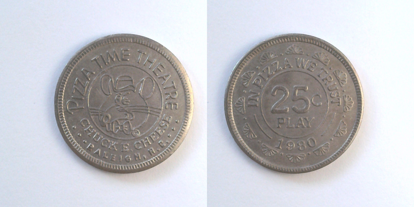 Chuck E. Cheese 144N 1980 Chuck E Cheese Token (144N) (1980) token — front and reverse