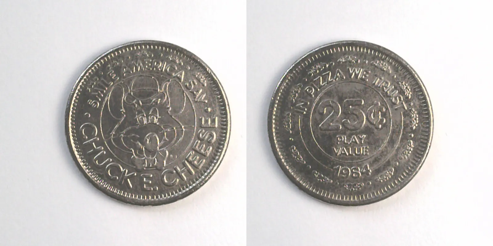 Chuck E. Cheese 217N 1984 Chuck E Cheese Token (217N) (1984) token — front and reverse