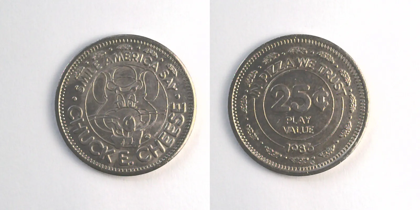 Chuck E. Cheese 210N 1986 Chuck E Cheese Token (210N) (1986) token — front and reverse