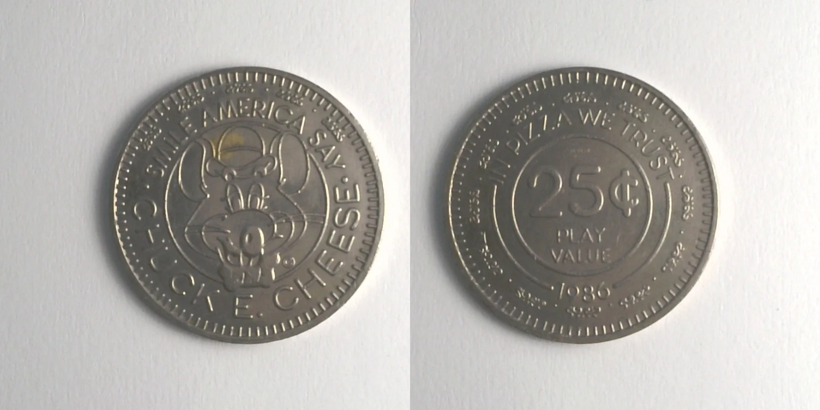Chuck E. Cheese 211N 1986 Chuck E Cheese Token (211N) (1986) token — front and reverse