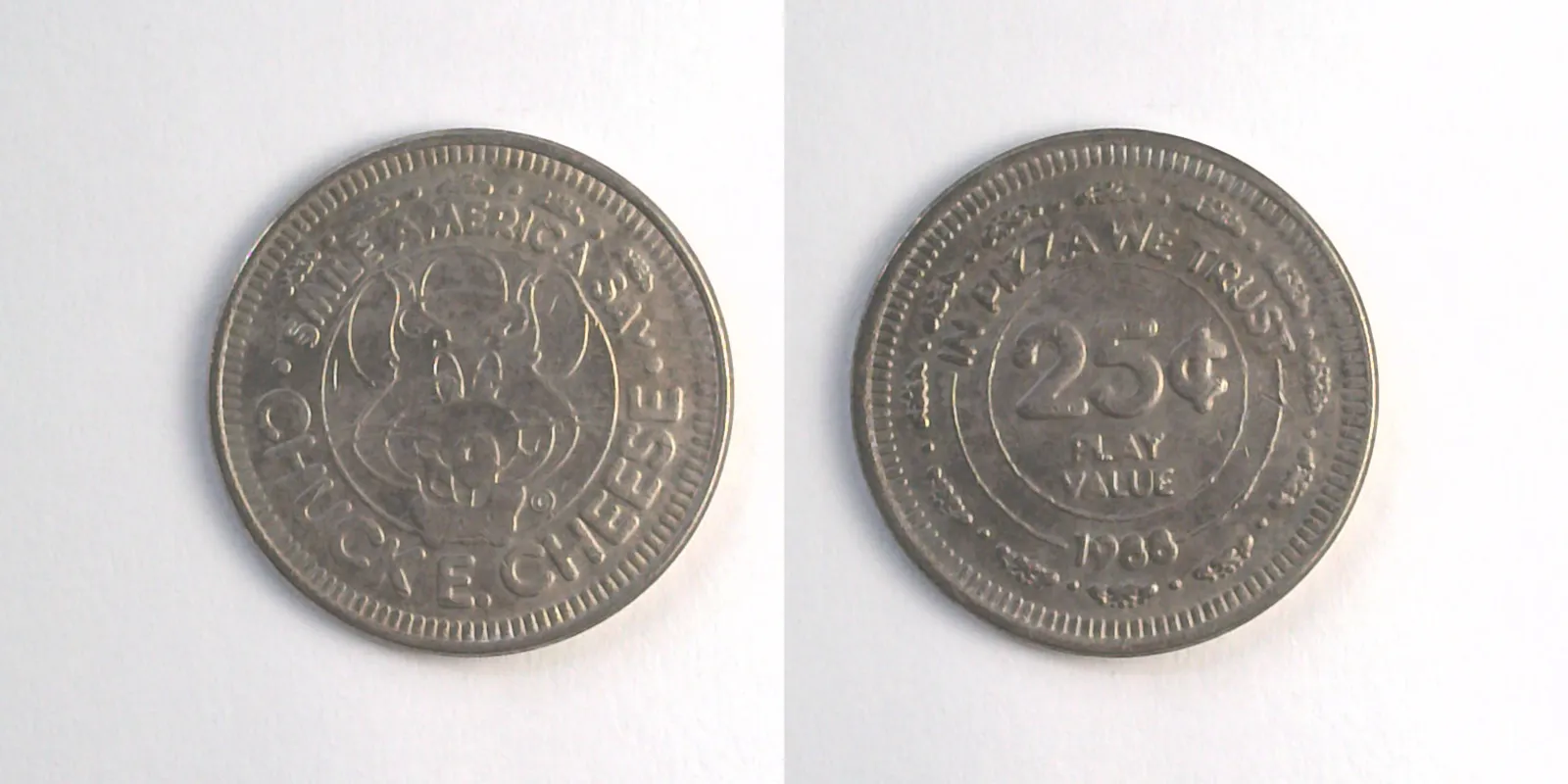 Chuck E. Cheese 214N 1988 Chuck E Cheese Token (214N) (1988) token — front and reverse