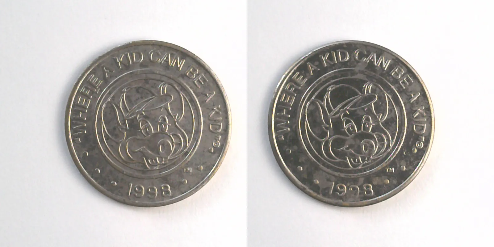 Chuck E. Cheese 404N 1998 Chuck E Cheese Token (404N) (1998) token — front and reverse