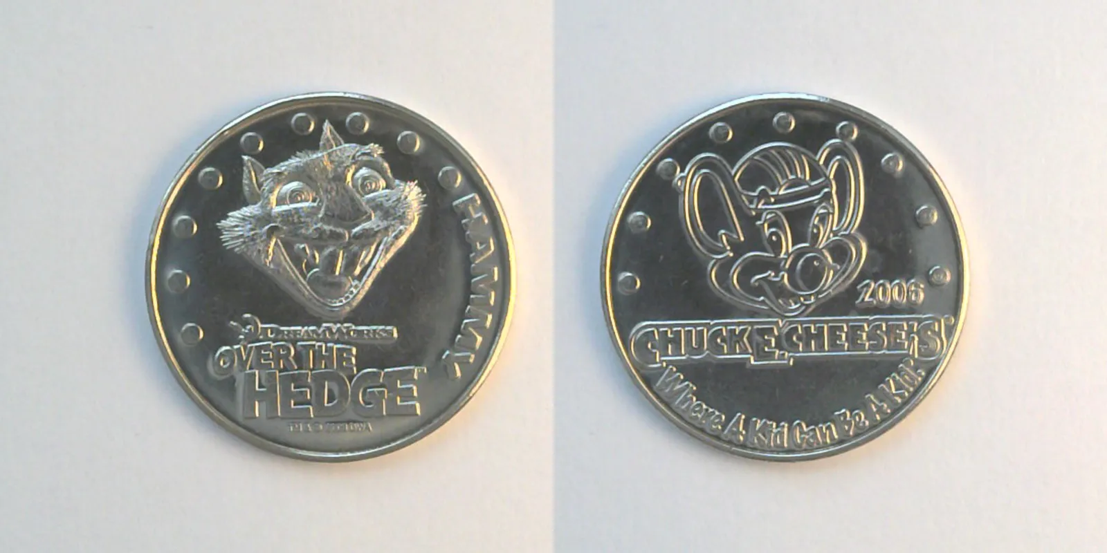 Chuck E. Cheese P06N 2006 Chuck E Cheese Promotional Hammy Token (P06N) (2006) token — front and reverse