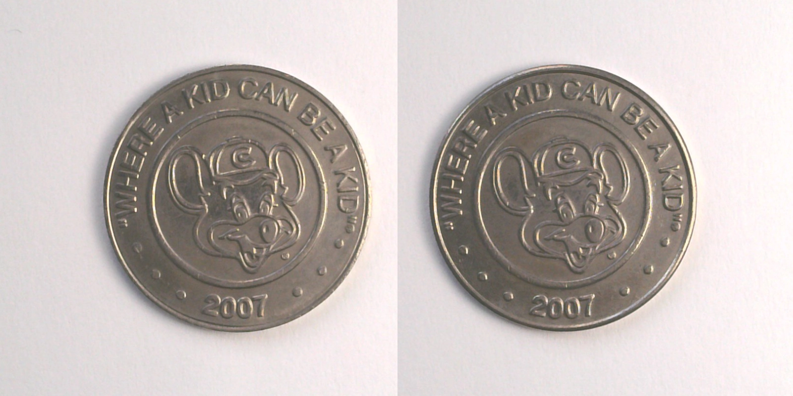 Chuck E. Cheese 414N 2007 Chuck E Cheese Token (414N) (2007) token — front and reverse