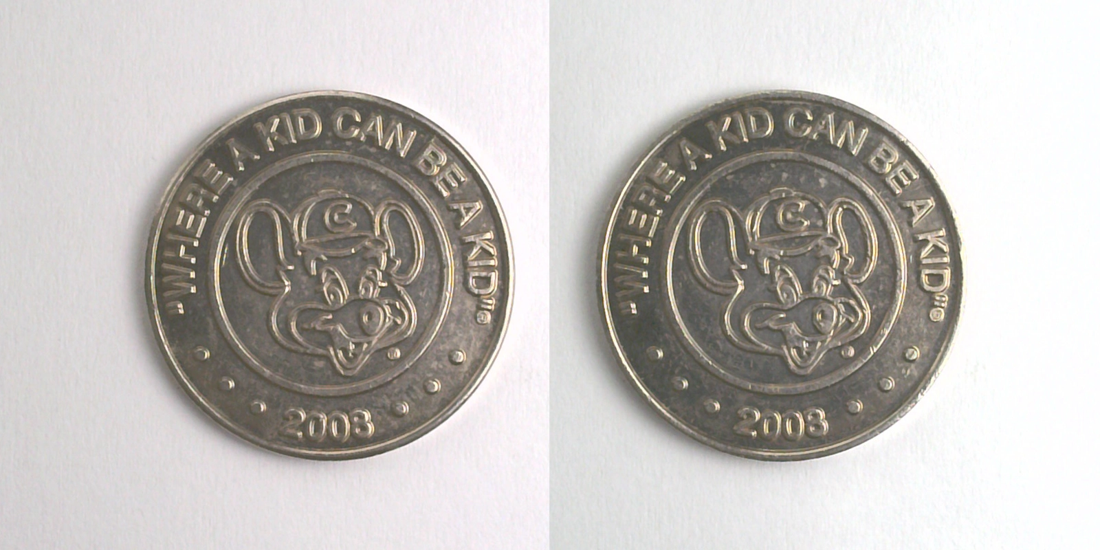 Chuck E. Cheese 415N 2008 Chuck E Cheese Token (415N) (2008) token — front