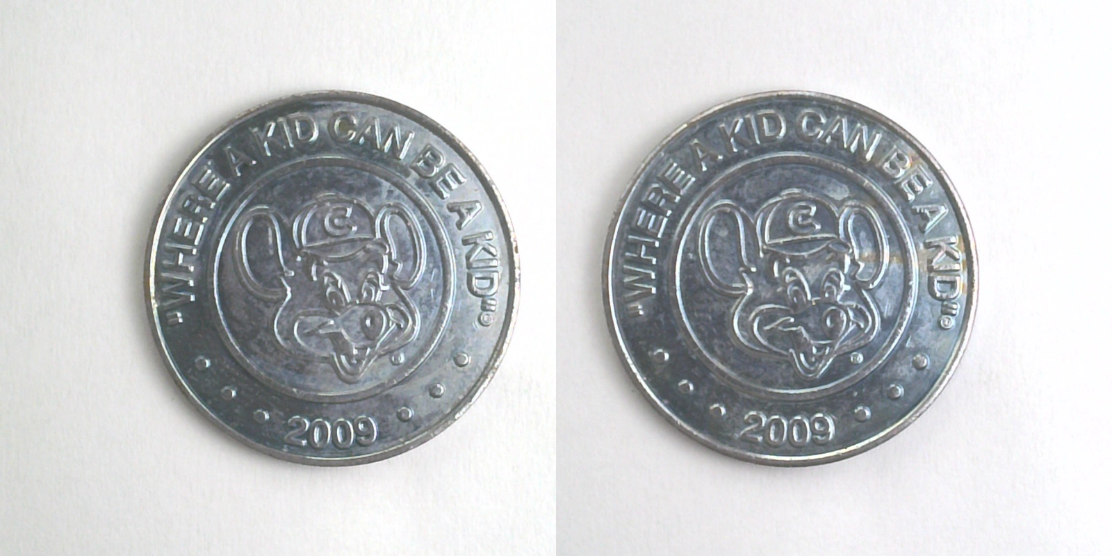Chuck E. Cheese 416N 2009 Chuck E Cheese Token (416N) (2009) token — front