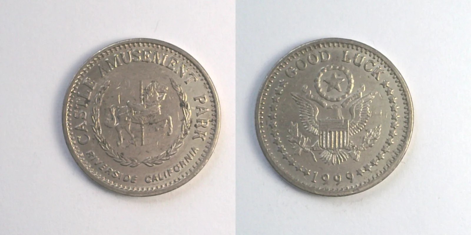 Castle Entertainment CP306N 1999 Castle Amusement Park Token (CP306N) (1999) token — front and reverse