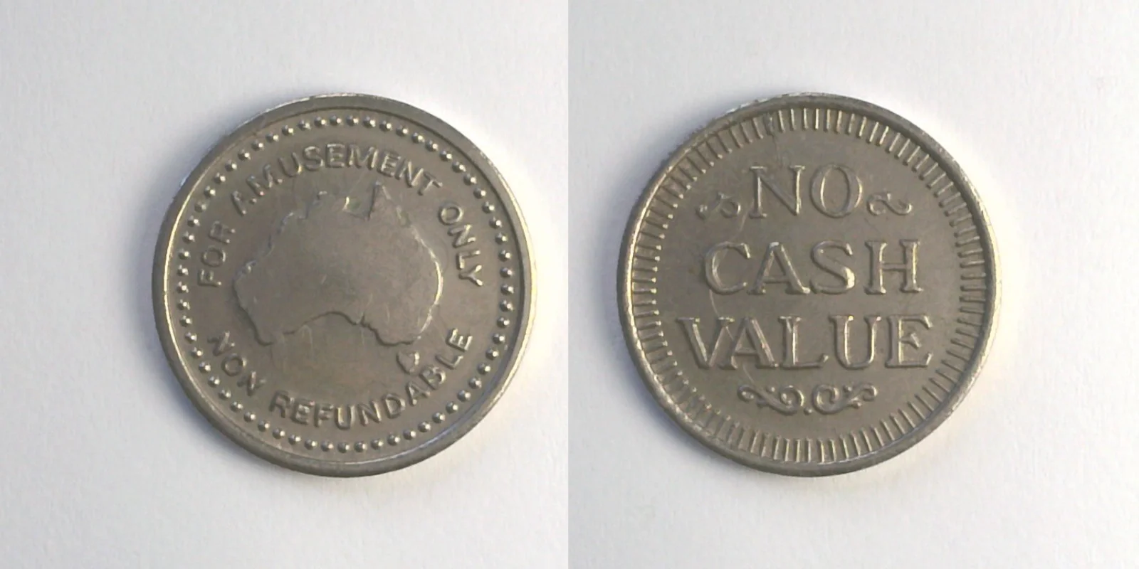 Grundy's G203N Grundy's Token (G203N) token — front and reverse