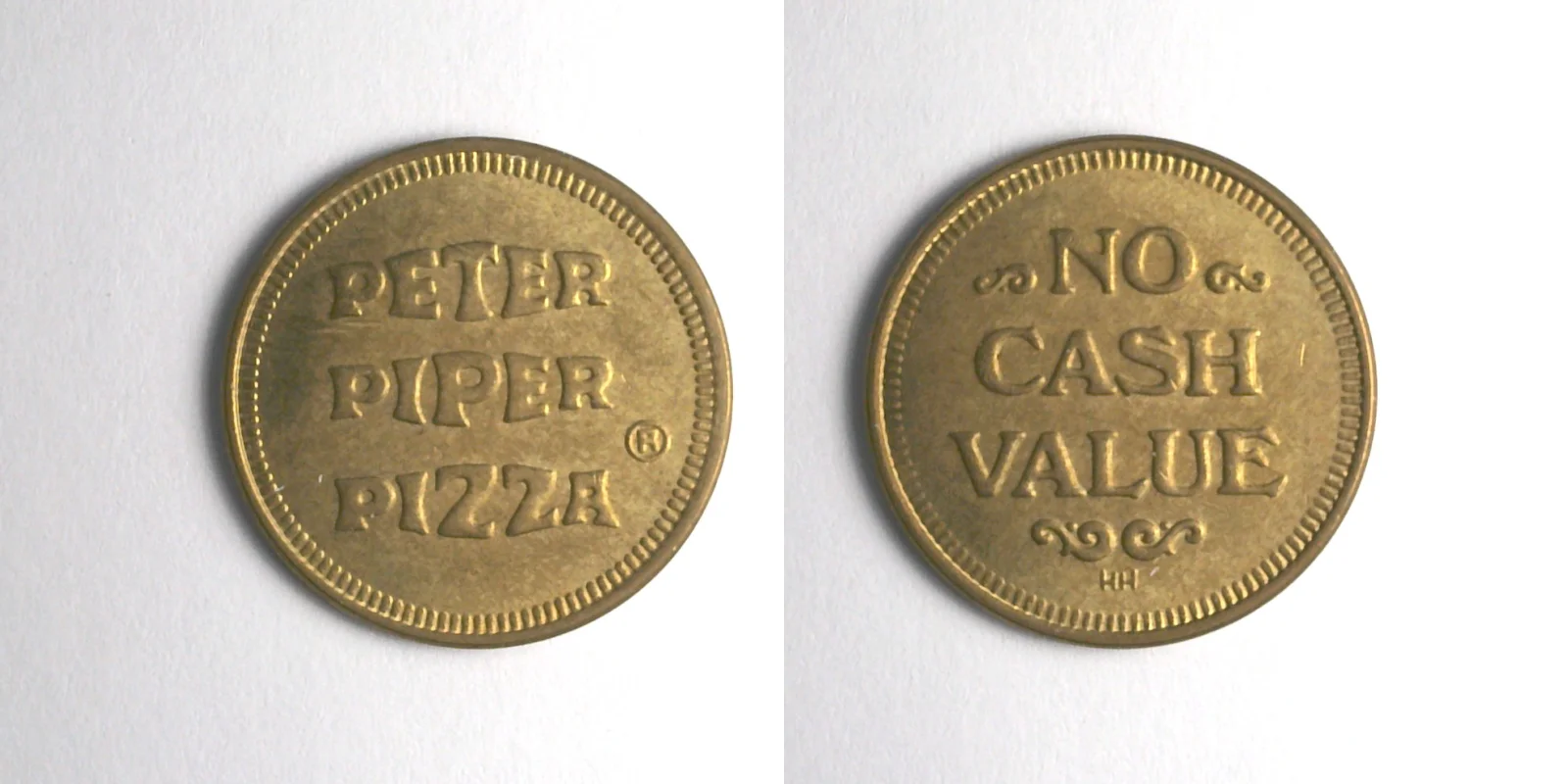 Peter Piper Pizza P112N Peter Piper Pizza Token (P112N) token — front and reverse