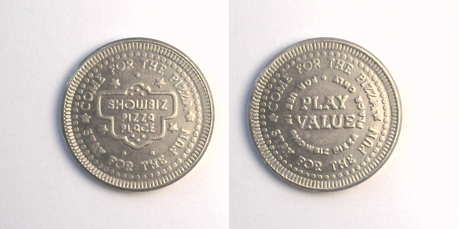 ShowBiz Pizza S06N Showbiz Pizza Place Token (S06N) token — front and reverse