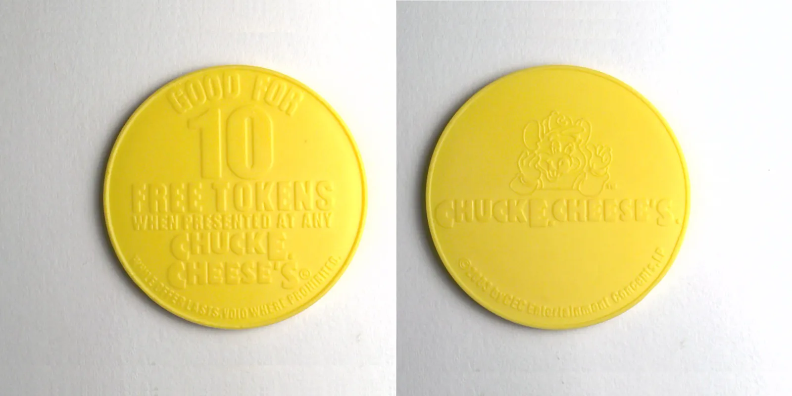 Chuck E. Cheese P05P-yellow 2003 Chuck E Cheese Promotional (P05P-yellow) (2003) token — front and reverse