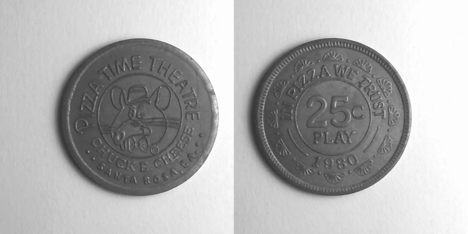 Chuck E. Cheese 147N 1980 Chuck E Cheese Token (147N) (1980) token — front and reverse