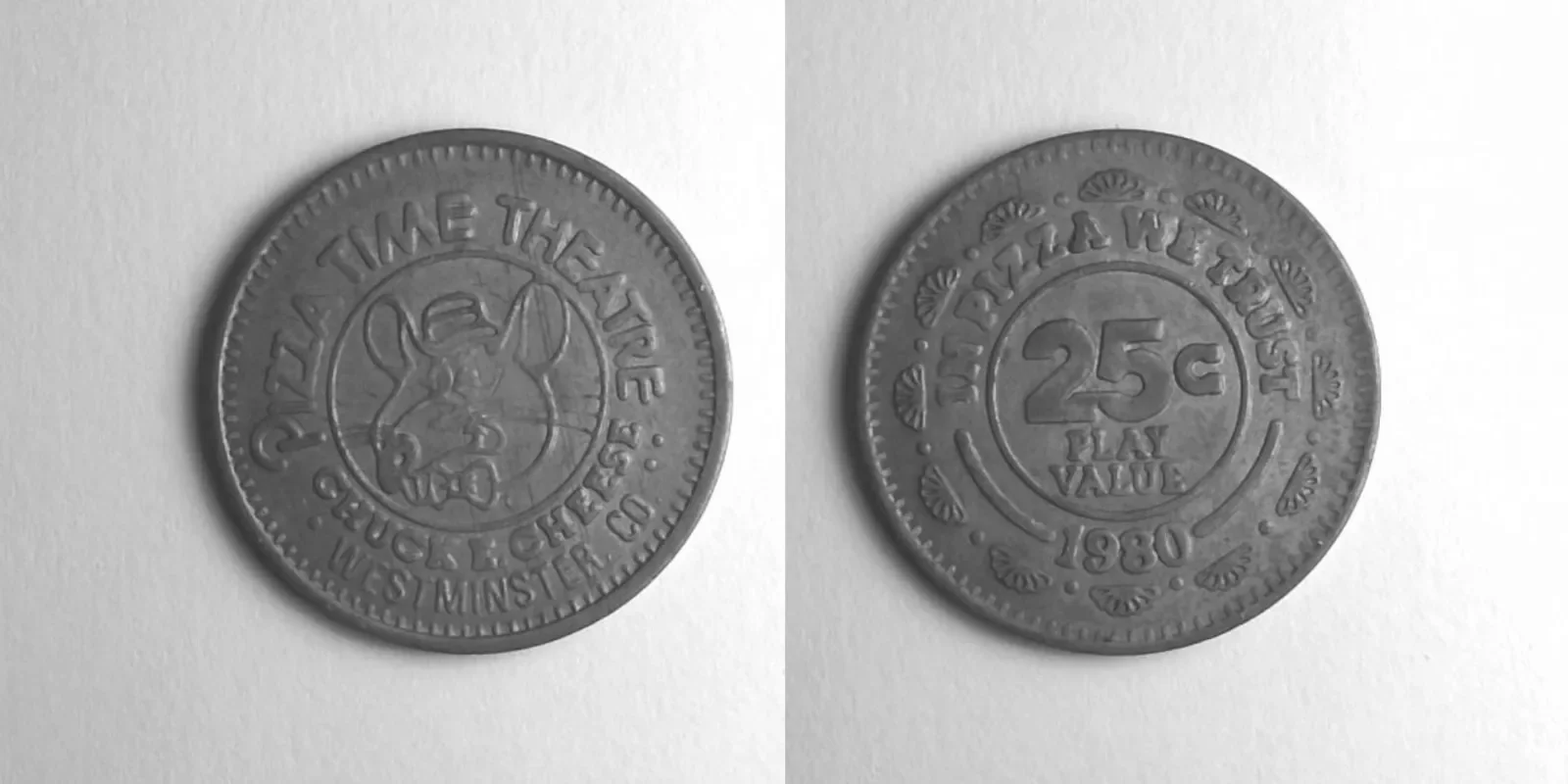Chuck E. Cheese 153N 1980 Chuck E Cheese Token (153N) (1980) token — front and reverse