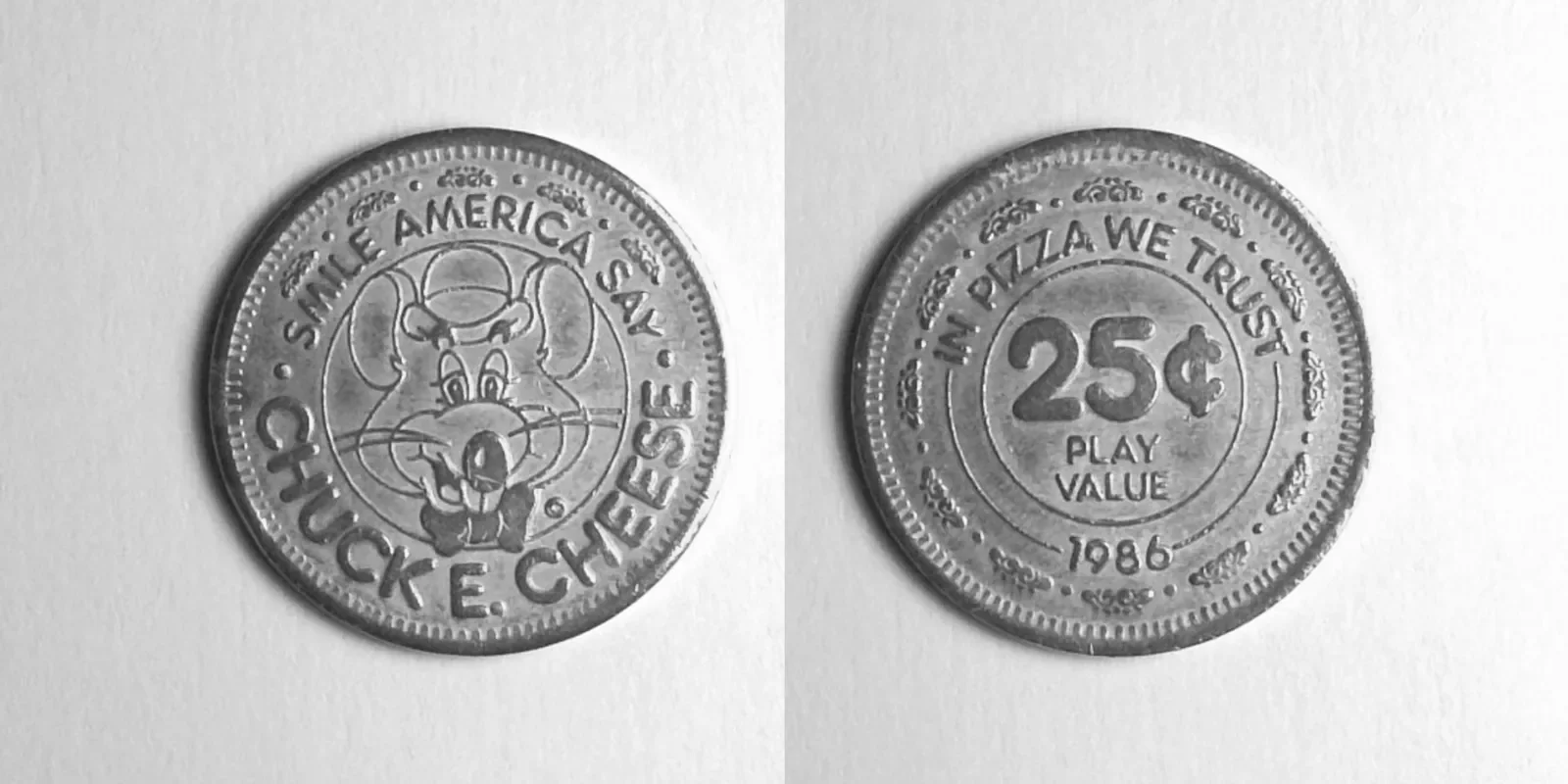 Chuck E. Cheese 209N 1986 Chuck E Cheese Token (209N) (1986) token — front and reverse
