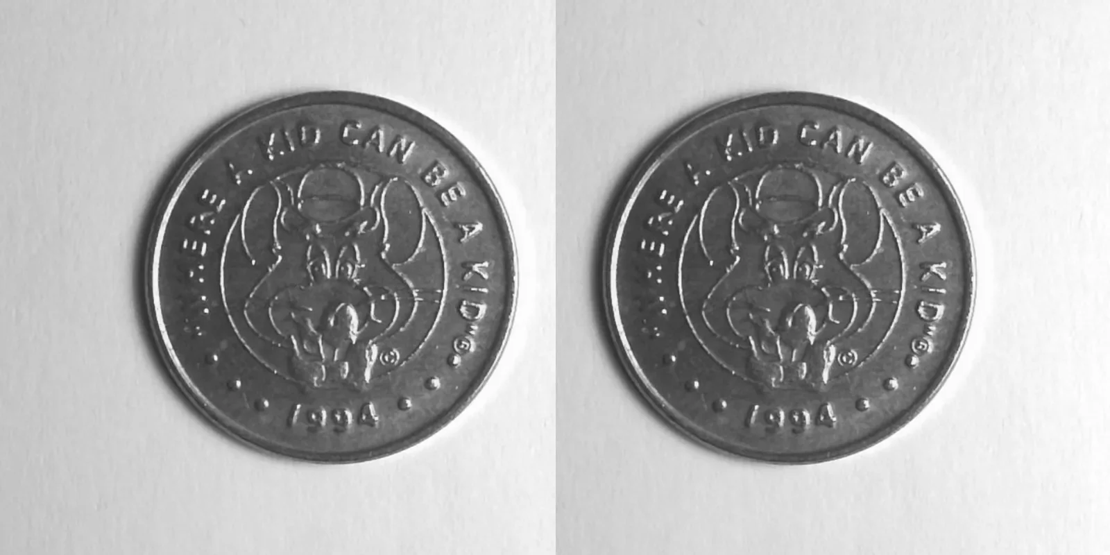 Chuck E. Cheese 314C 1994 Chuck E Cheese Token (314C) (1994) token — front and reverse