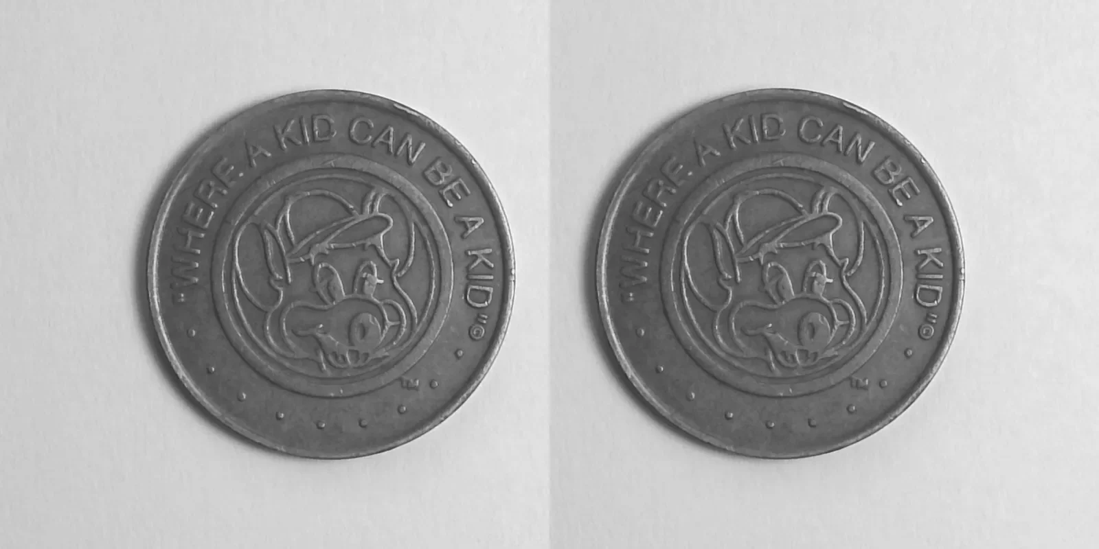 Chuck E. Cheese 407N Dateless Chuck E Cheese Token (407N) token — front and reverse