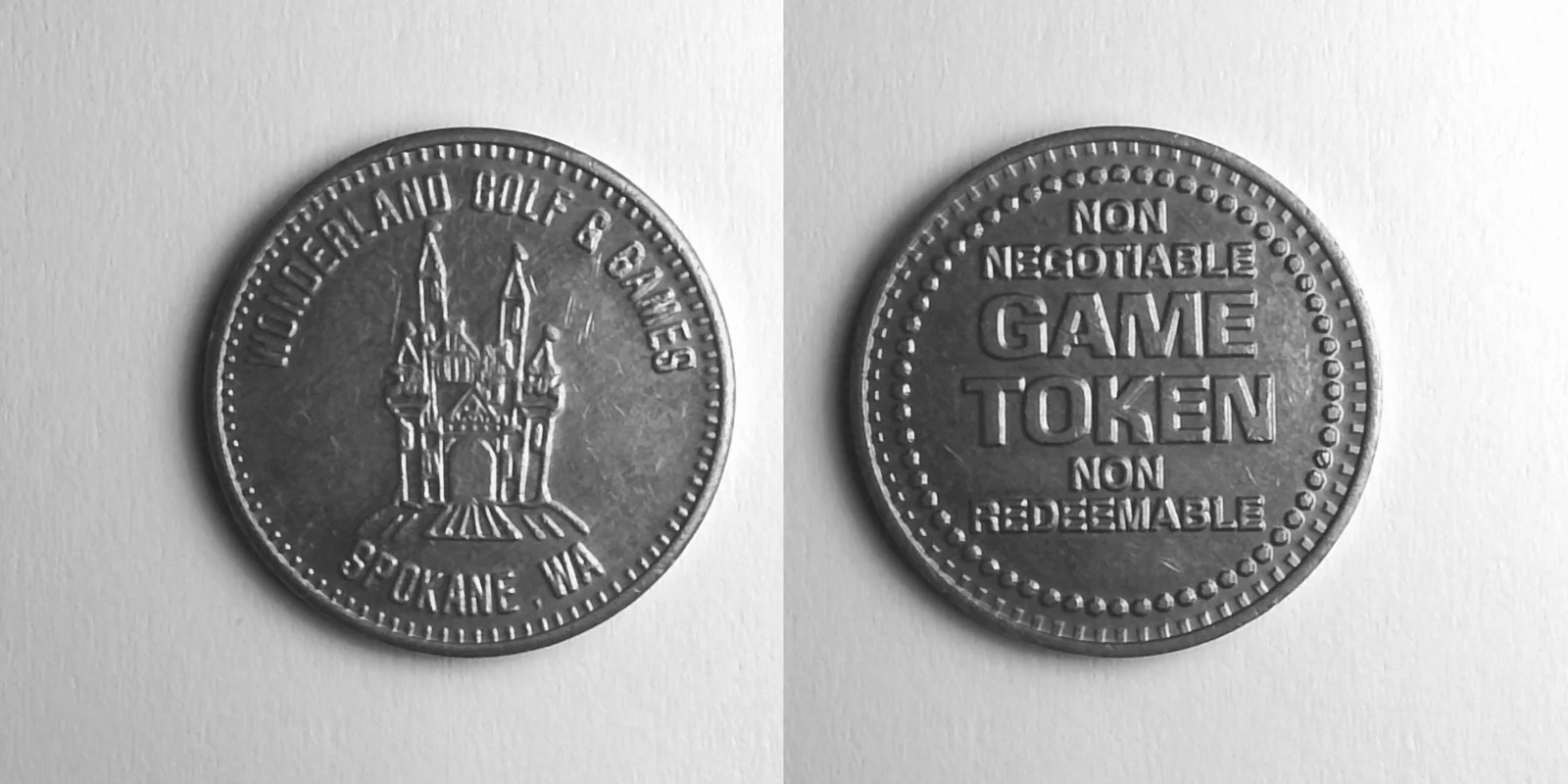 Wonderland Golf & Games WGG103N Wonderland Golf & Games Token (WGG103N) token — front and reverse