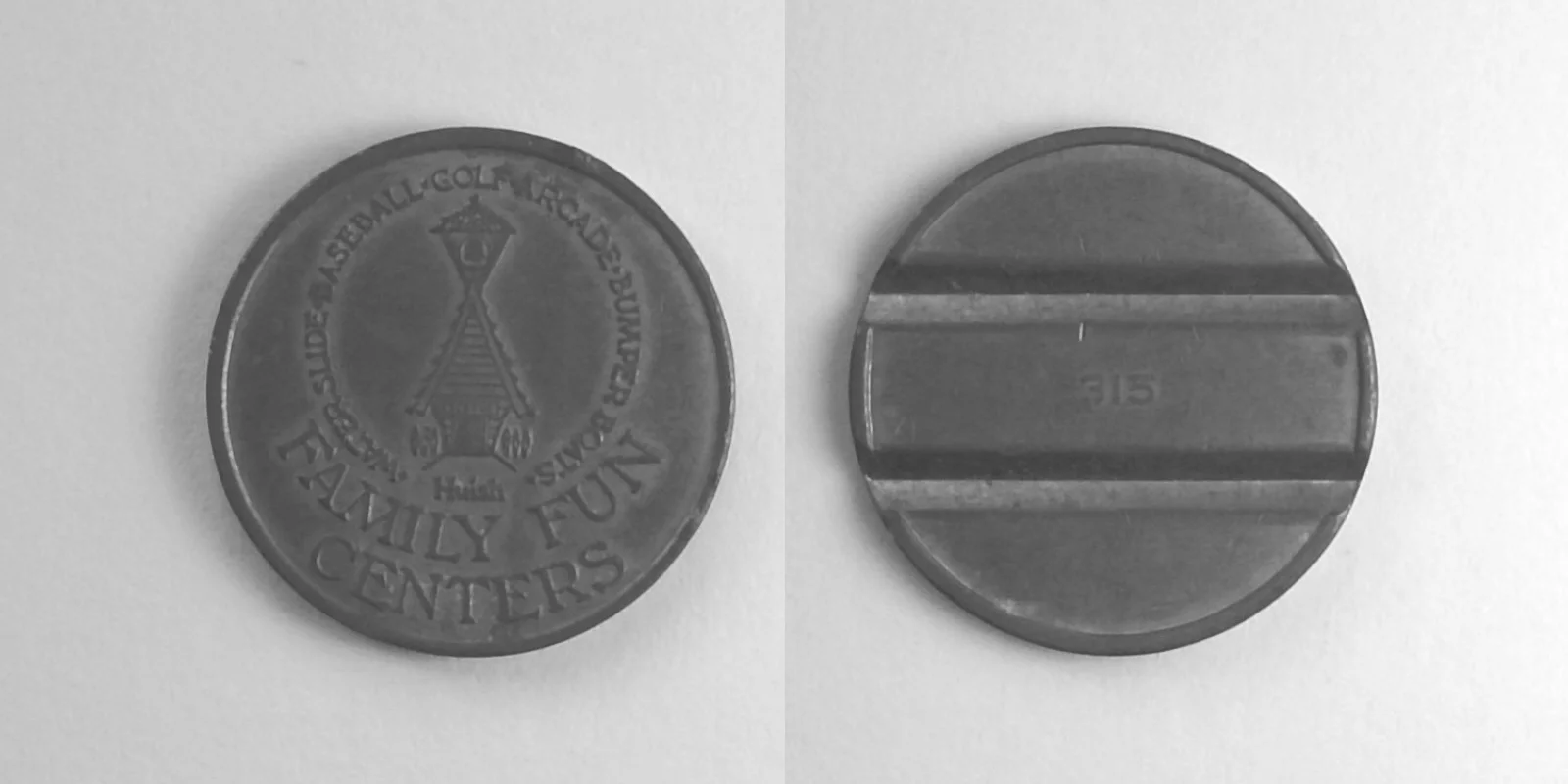Bullwinkle's Entertainment BW601C Huish Family Fun Centers 315 Token (BW601C) token — front and reverse