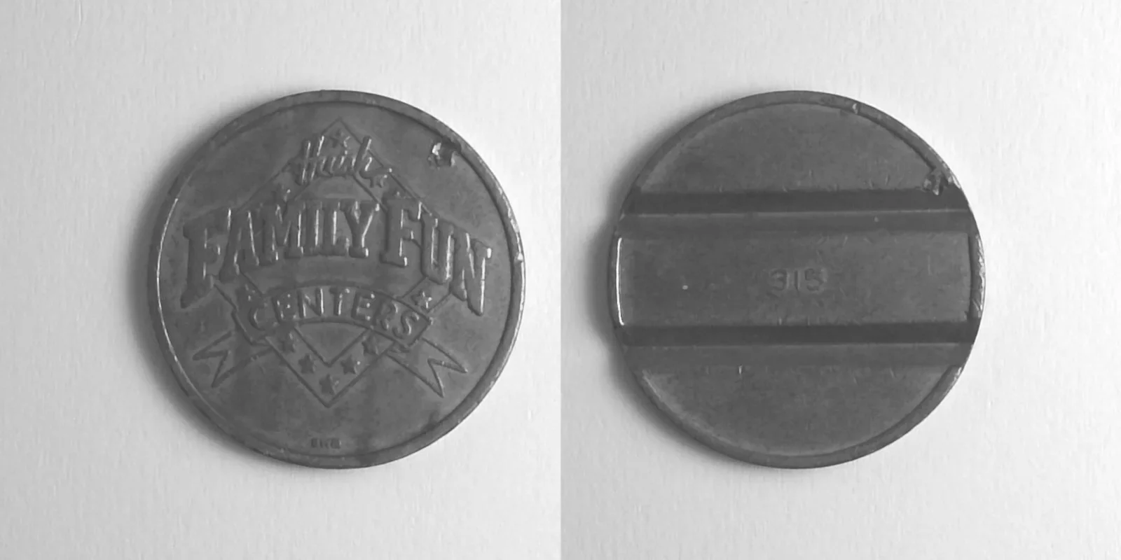 Bullwinkle's Entertainment BW501N Huish Family Fun Centers 315 Token (BW501N) token — front and reverse